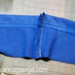Using the two rectangle sleeve pieces, place them right sides together and sew them together to create one long piece. This piece will be used to create the collar.