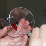 Place glue around edge of glass and stick down to base of ornament.